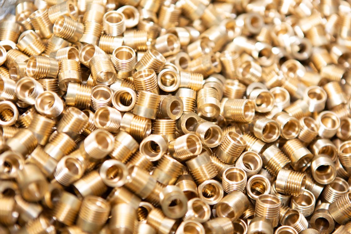 Close-up of brass threaded components